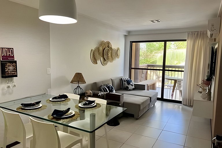 Beachfront Apartment in a Condo with Balcony