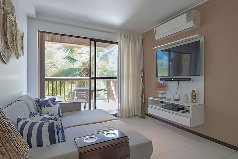 Beachfront Apartment in a Condo with Balcony